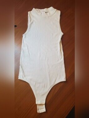 Ribbed Sleeveless White Bodysuit